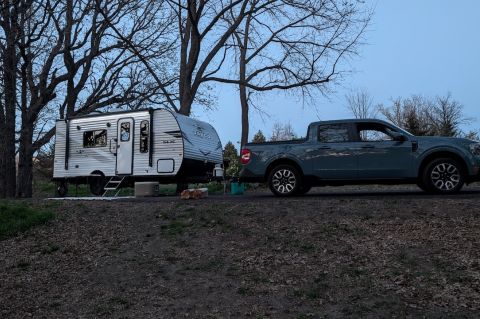 Jayco Travel Trailer and Ford Maverick at campsite